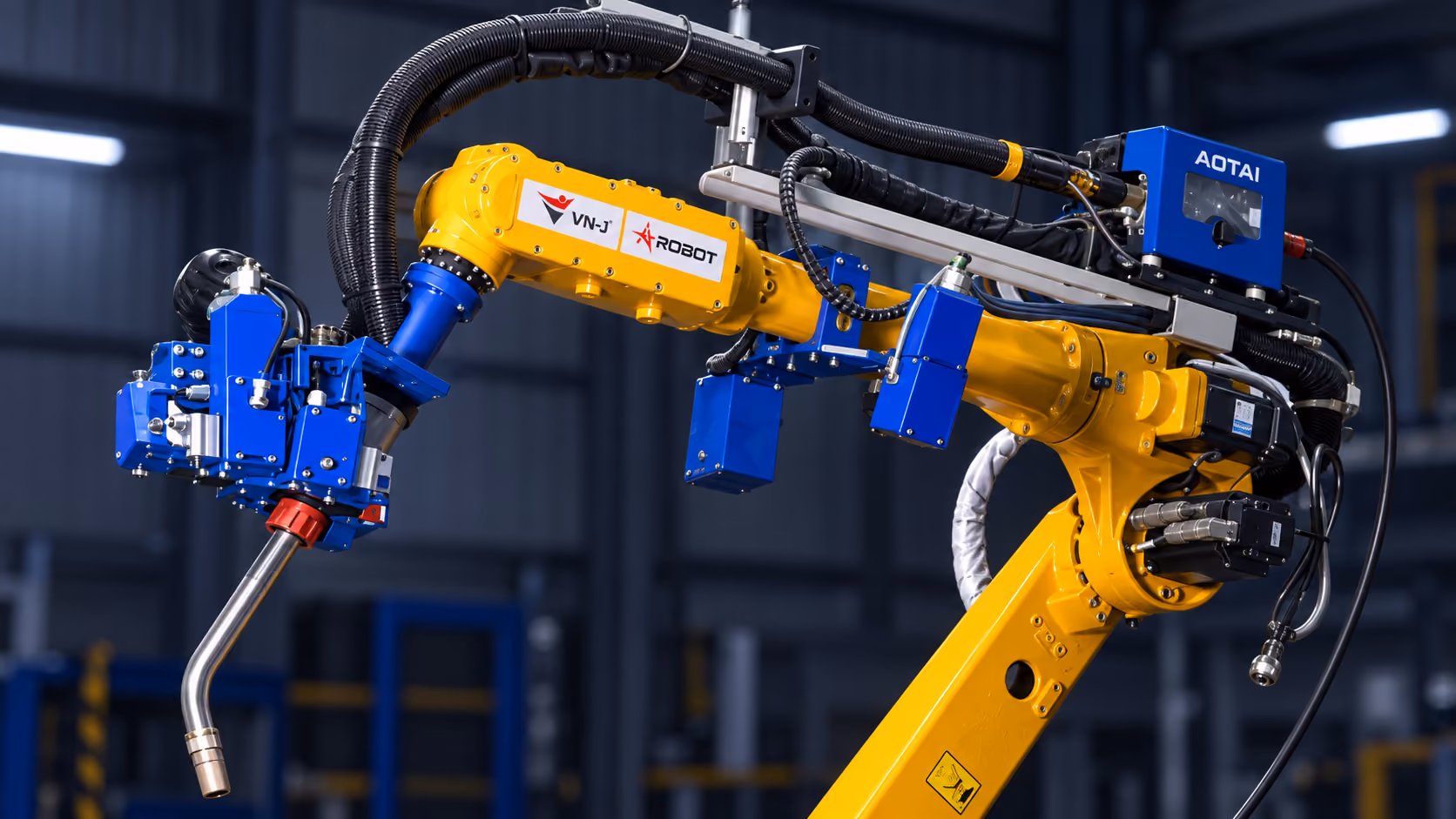 Hình minh họa cụm đầu hàn, cổ tay và dây dẫn của hệ robot với nhãn VN‑J.